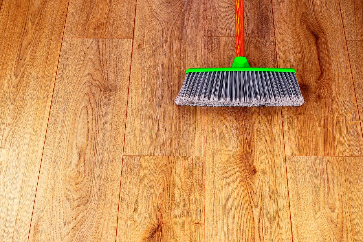 cleaning-wood-floor-broom